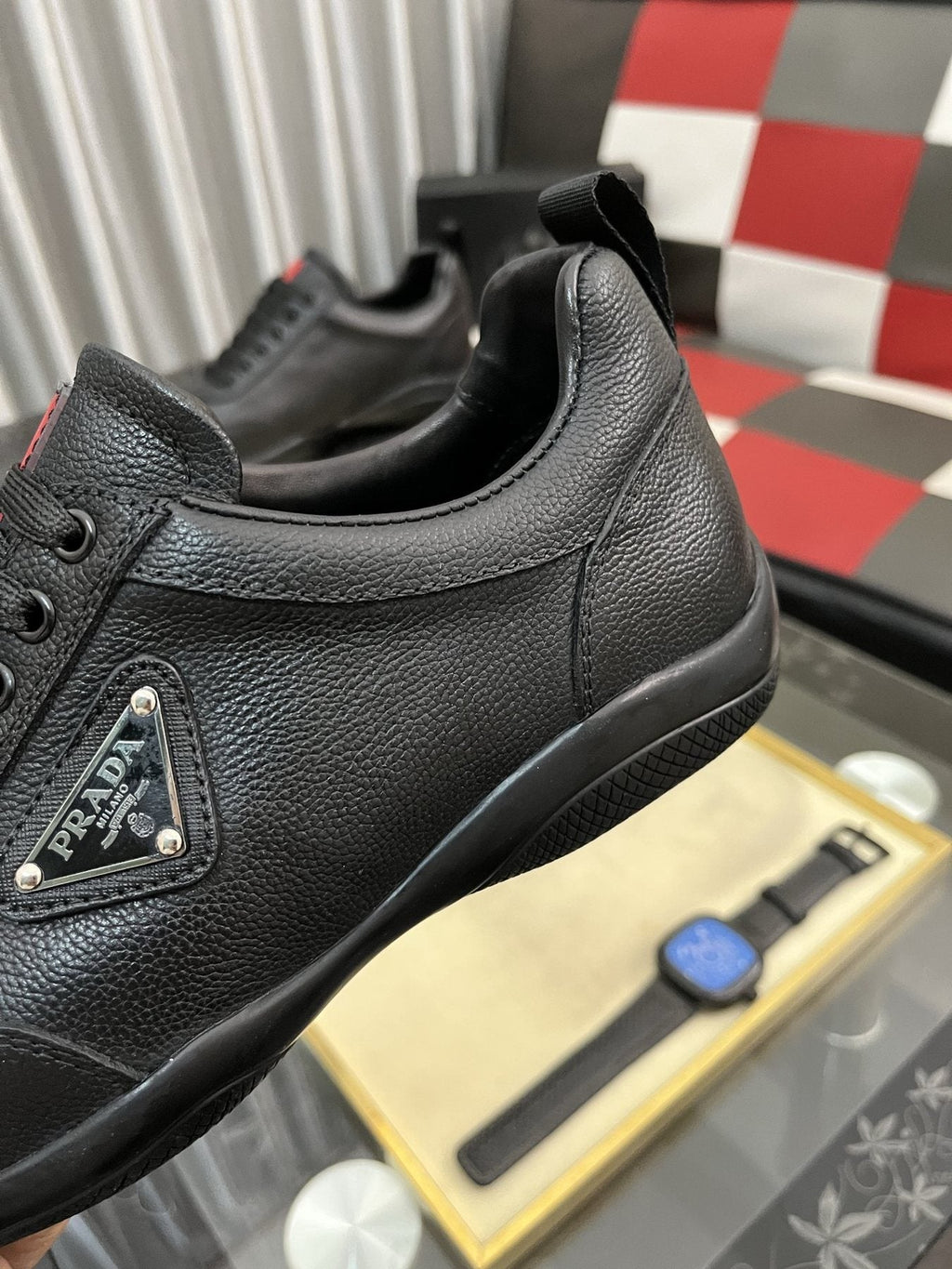Prada Black Lace-Up Sneakers with Red Tab